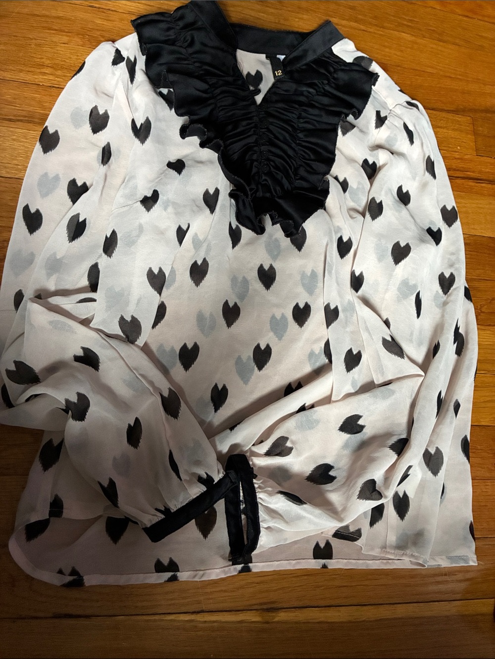 Black & Pink Heart-Print Ruffle V-Neck Blouse
